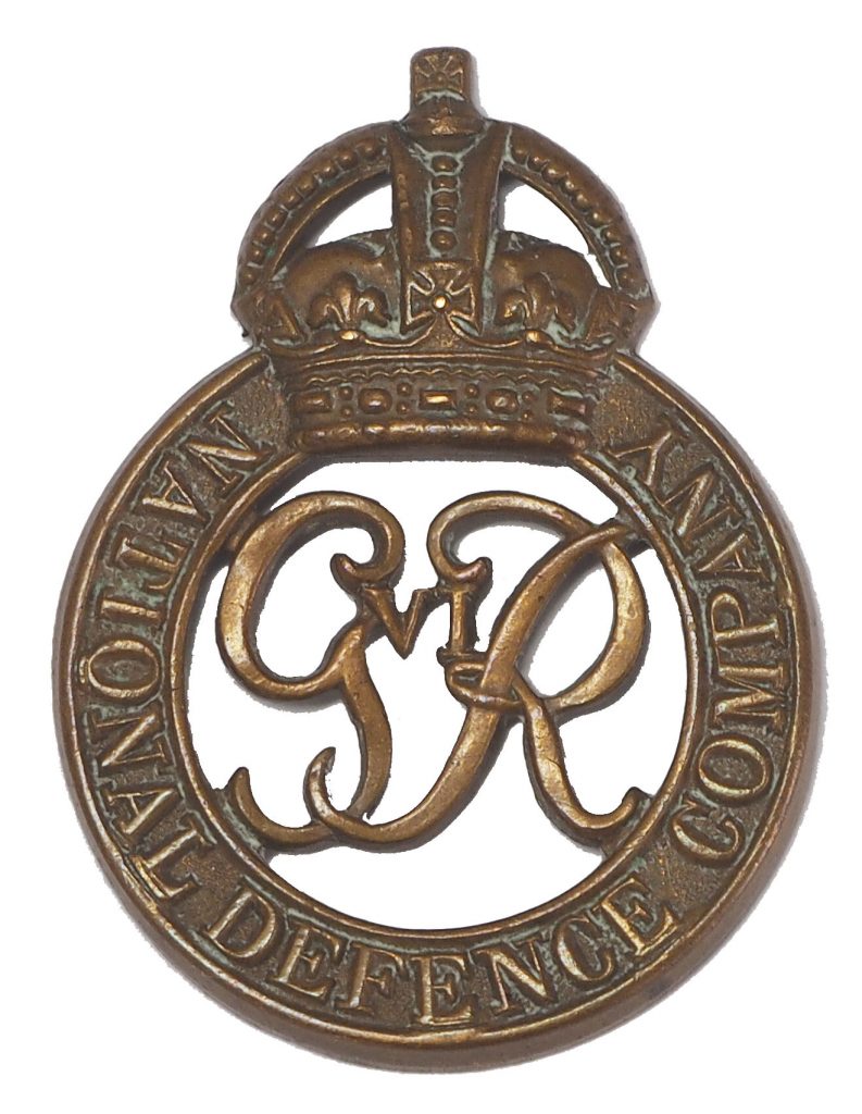 National Defence Company cap badge KK2162