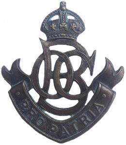 Old boys corp cap badge